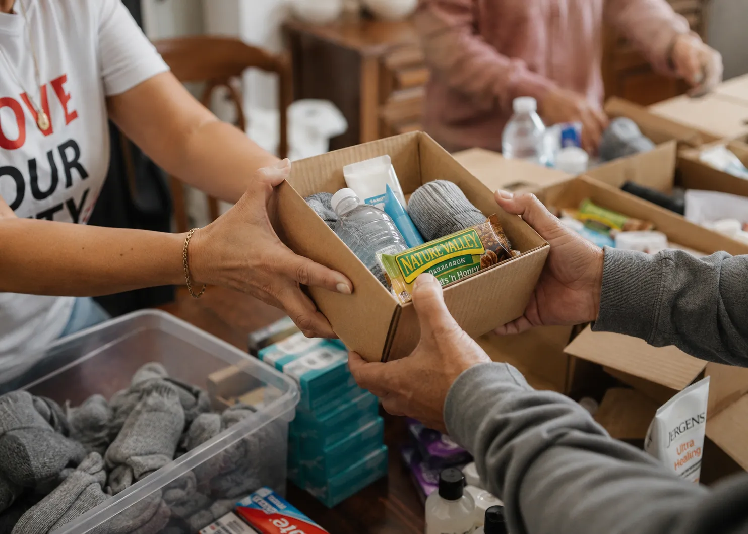 People giving kits in the community